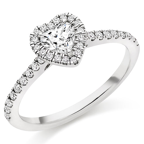 platinum ring with heart cut diamond, diamond halo and stone set shoulders. Carathea jewellers
