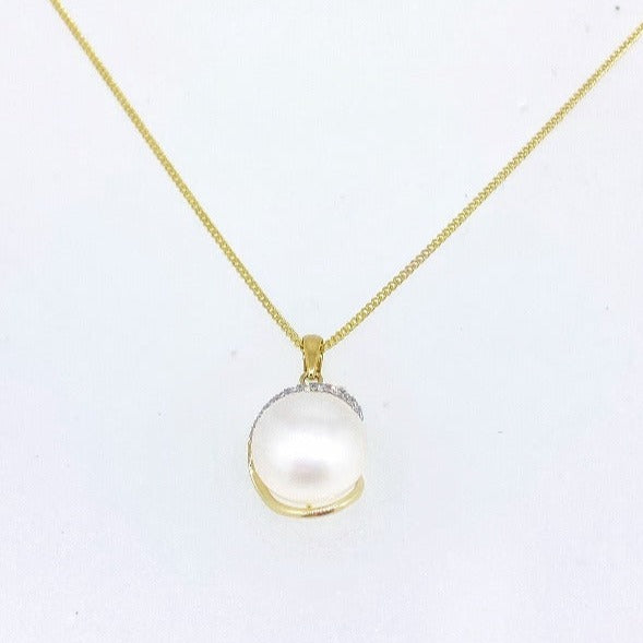 Gold pendant with diamonds and pearl Jewellery Carathea