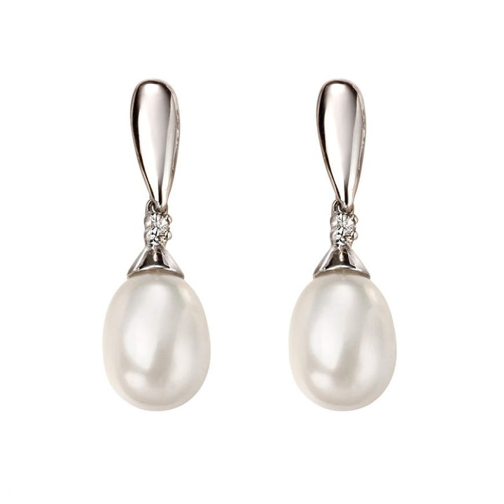 These are 18 carat white gold drop earrings with freshwater pearls and small accent diamonds.