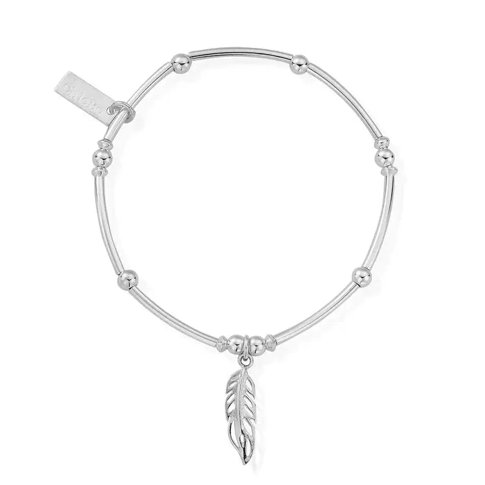 Chlobo silver bracelet with noodles and ball beads and a feather charm | Carathea