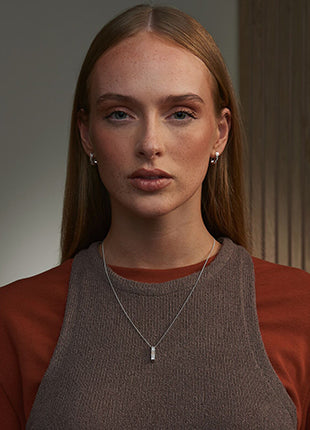 ilver and Welsh gold cariad pendant with white topaz Jewellery Carathea