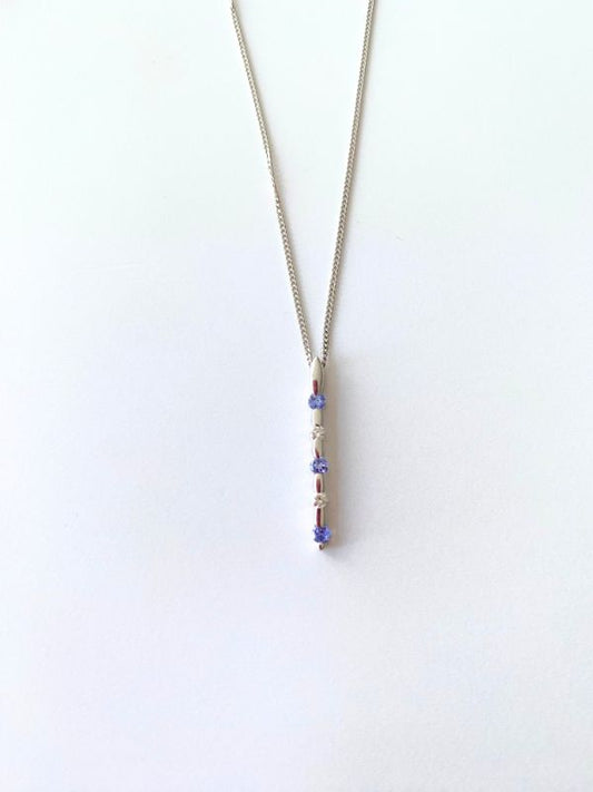 white gold tanzanite & diamond stick pendant Carathea jewellers